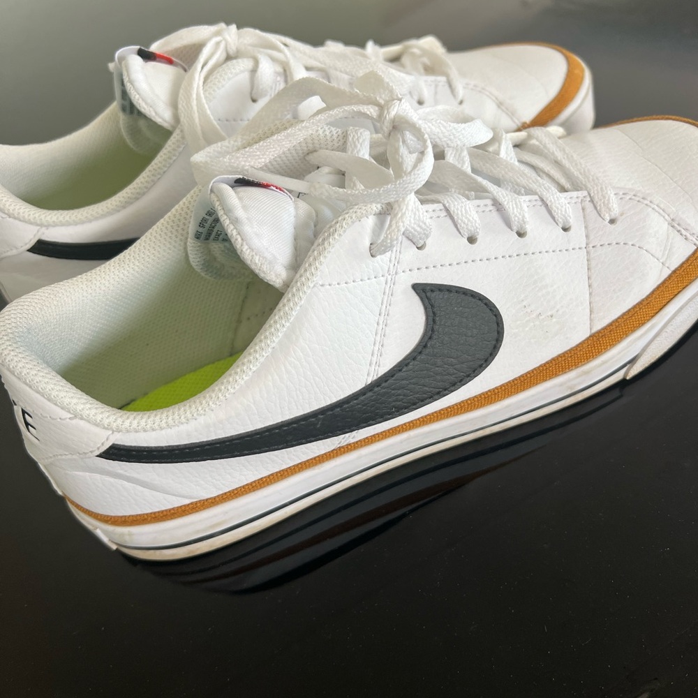 Nike White and Black Sneakers with Orange Accents